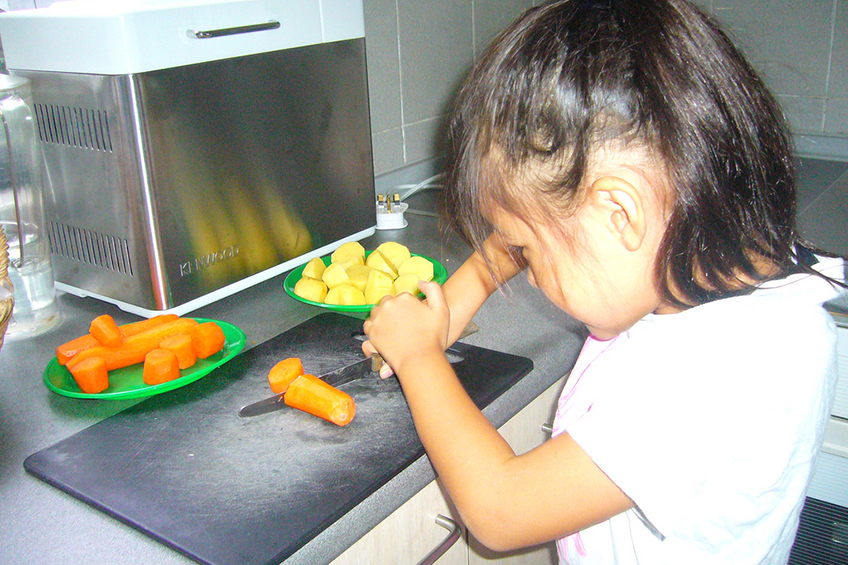 child cooking
